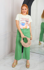 Blusa con estampado y aplicaciones de brillos