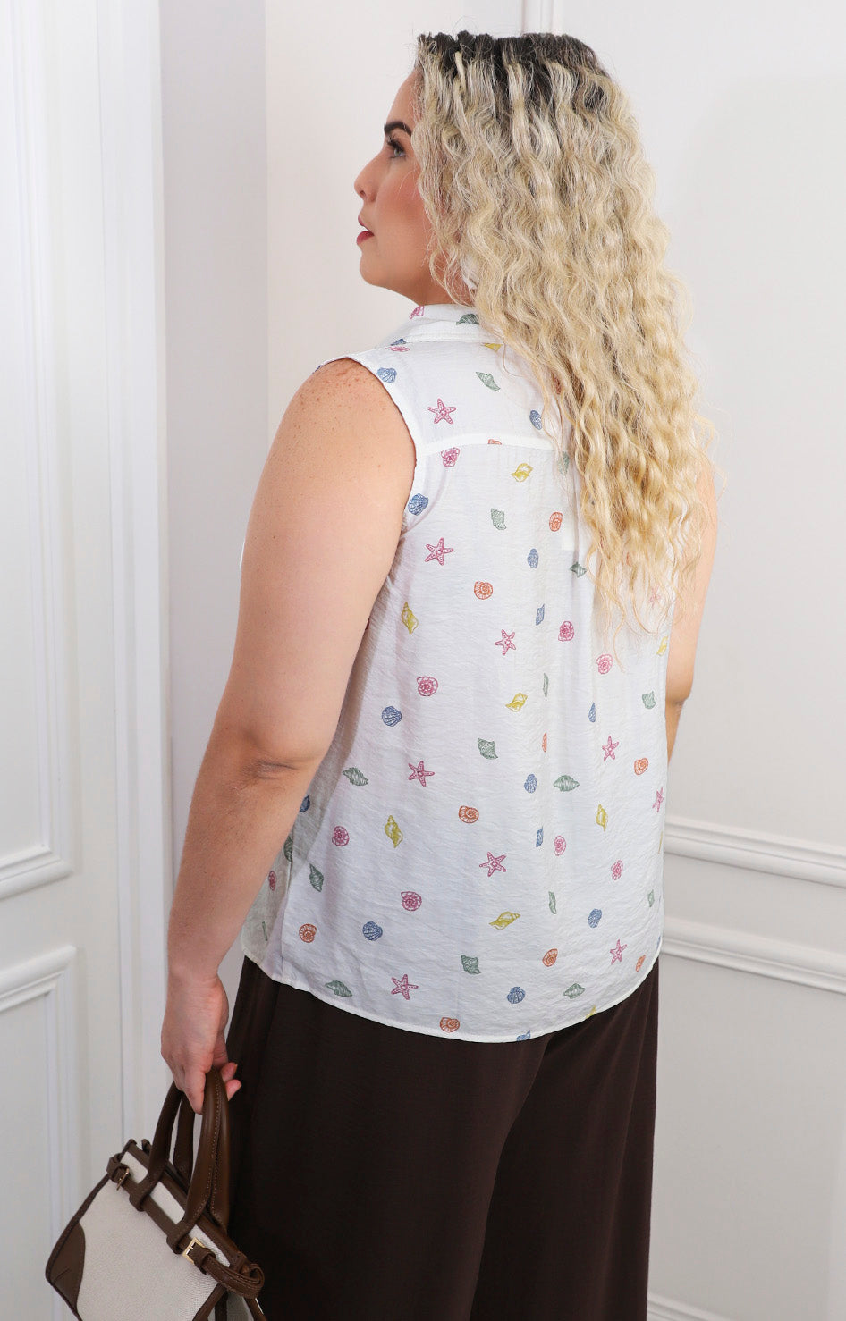 Blusa sin mangas con estampado de conchas