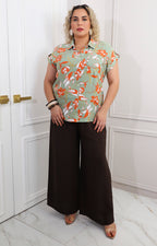 Blusa camisera verde con estampado floral
