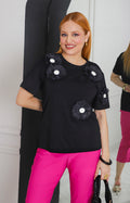 Blusa negra con flores 3D