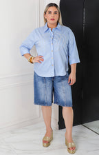 Blusa lisa con perlas