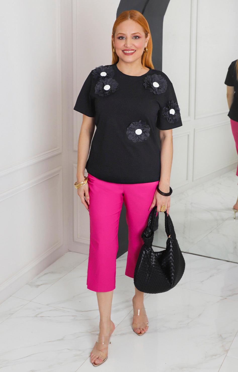 Blusa negra con flores 3D