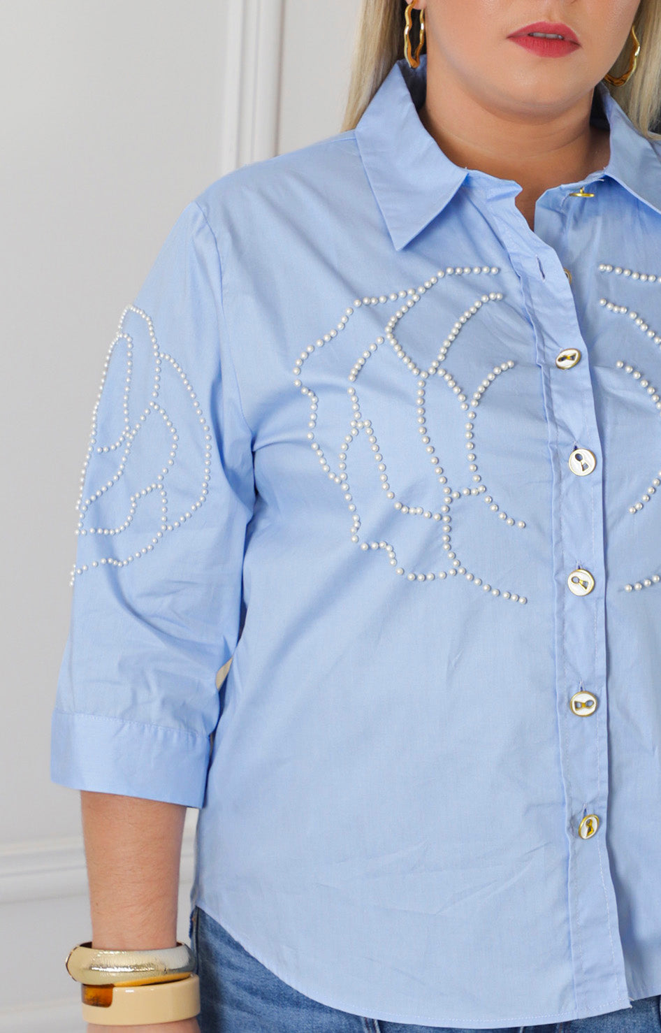 Blusa lisa con perlas