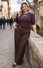 Blusa de punto beige con moño