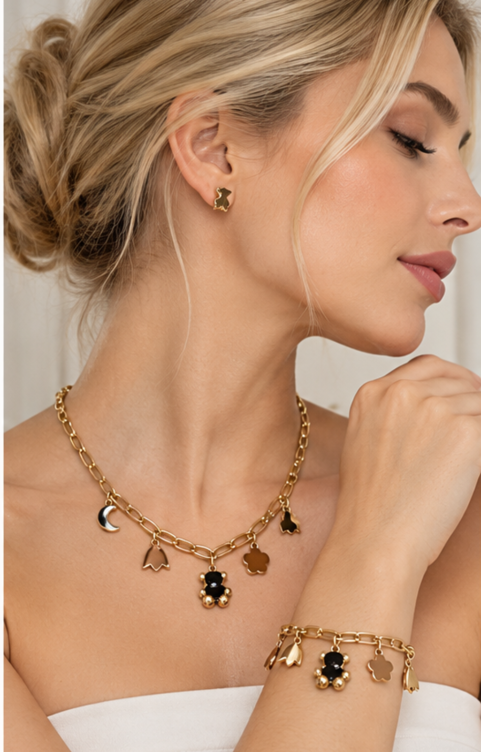 Set de collar, pulsera y aretes con dijes y osito