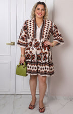 Vestido con estampado geométrico y lazo