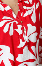 Blusa con estampado floral blanco y botones dorados