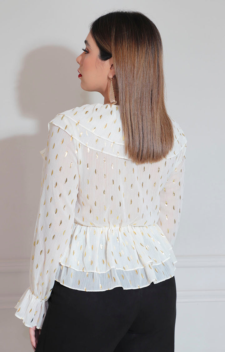 Blusa beige con olanes