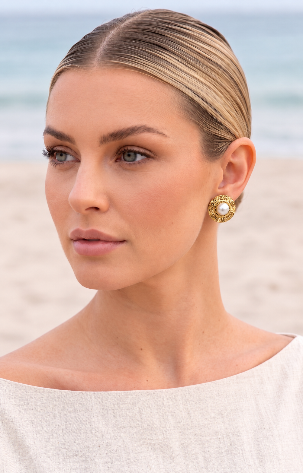 Aretes dorado con perla