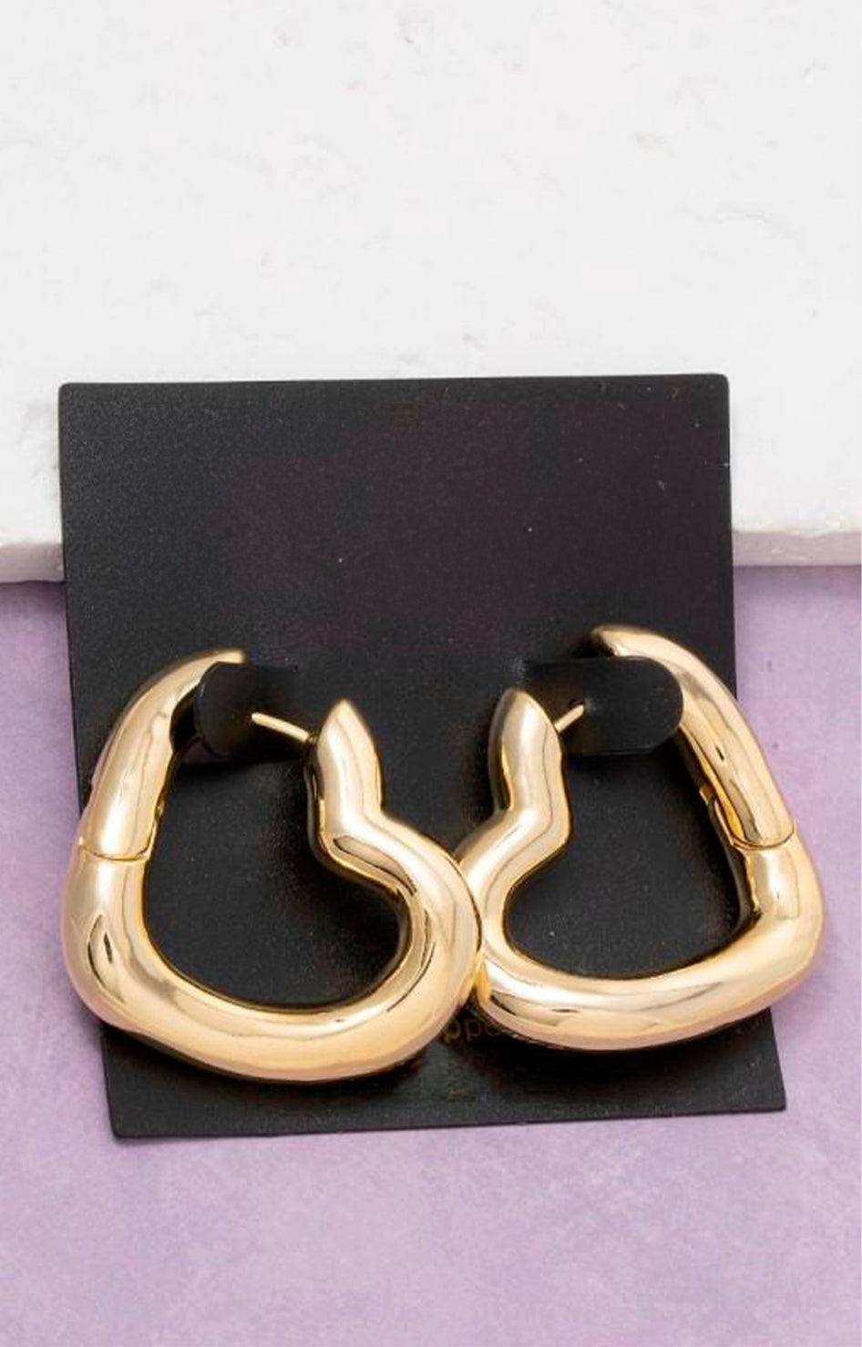 Aretes dorados de corazón - ARETE Boutiquemirel 