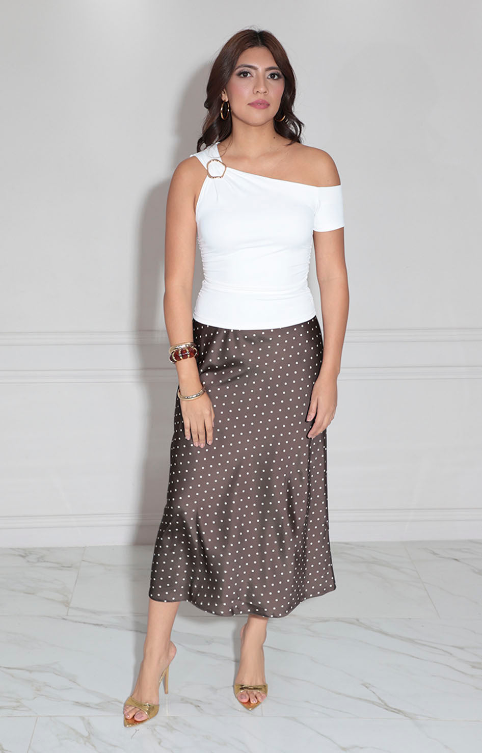 Blusa blanca asimétrica