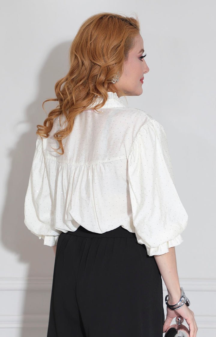 Blusa beige con brillos