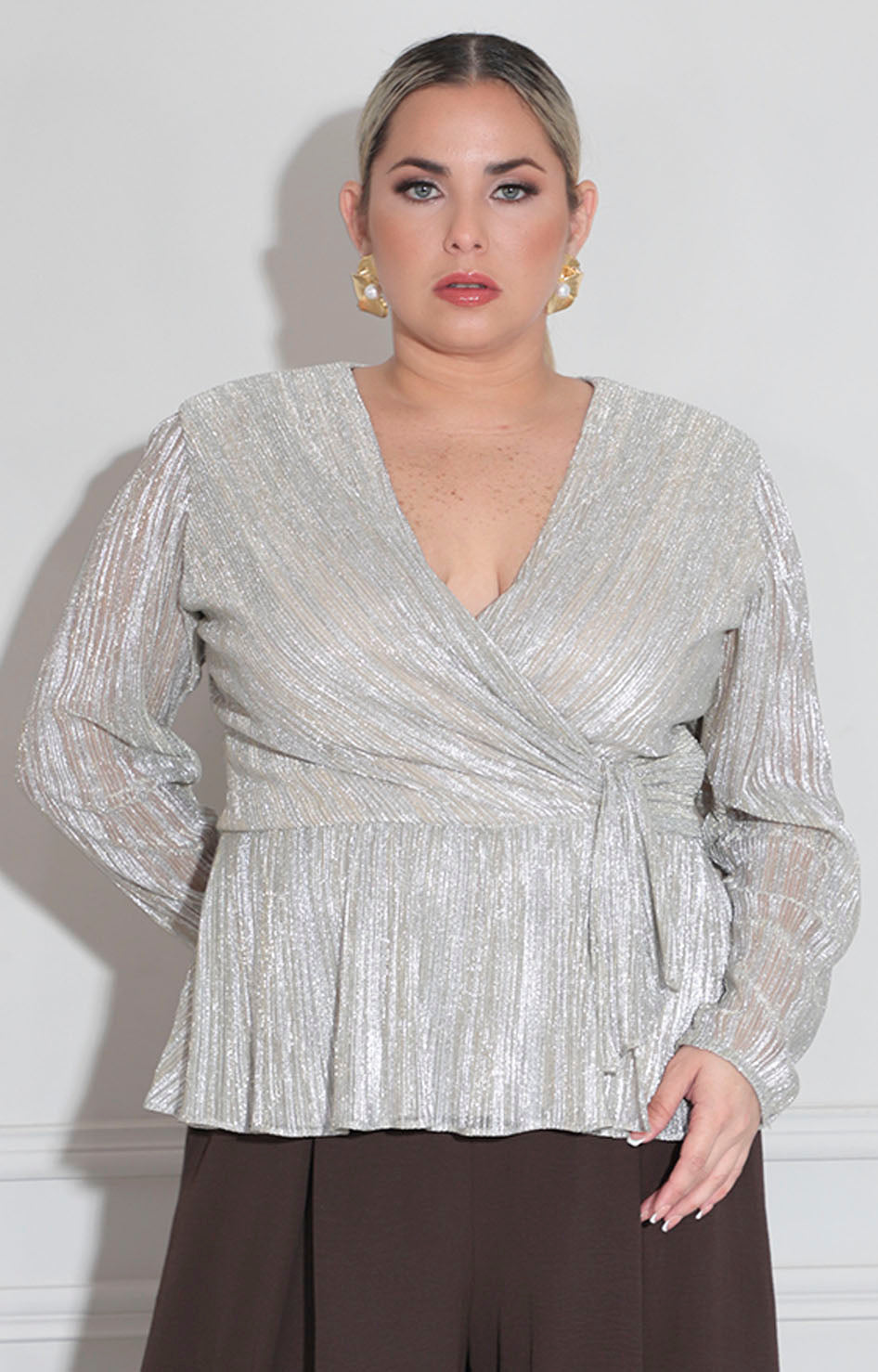 Blusa beige brillosa