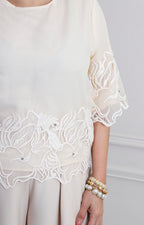 Blusa beige con bordado