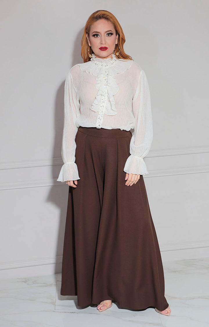 Blusa beige con perlas