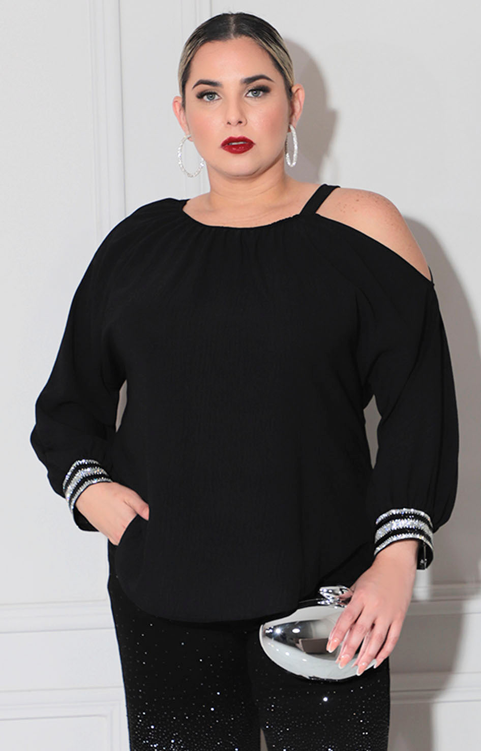 Blusa negra con plata