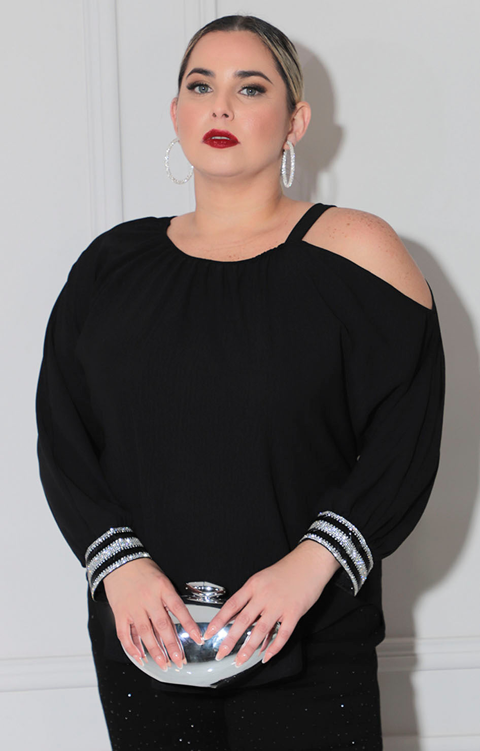 Blusa negra con plata