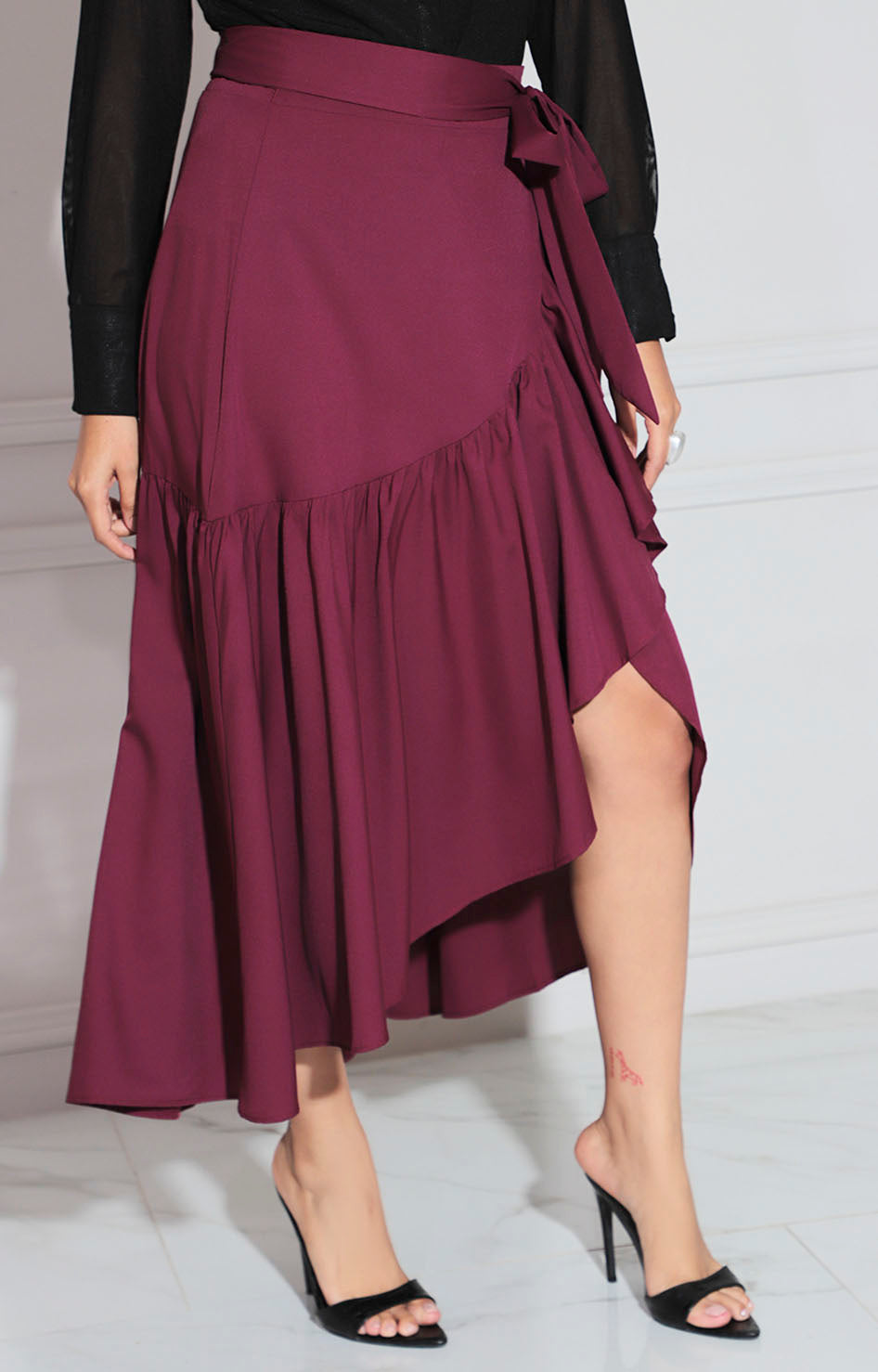 Falda vino con volante
