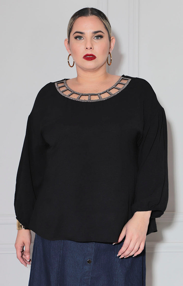 Blusa negra con plata
