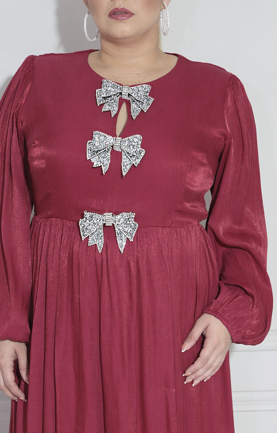 Vestido vino con moños