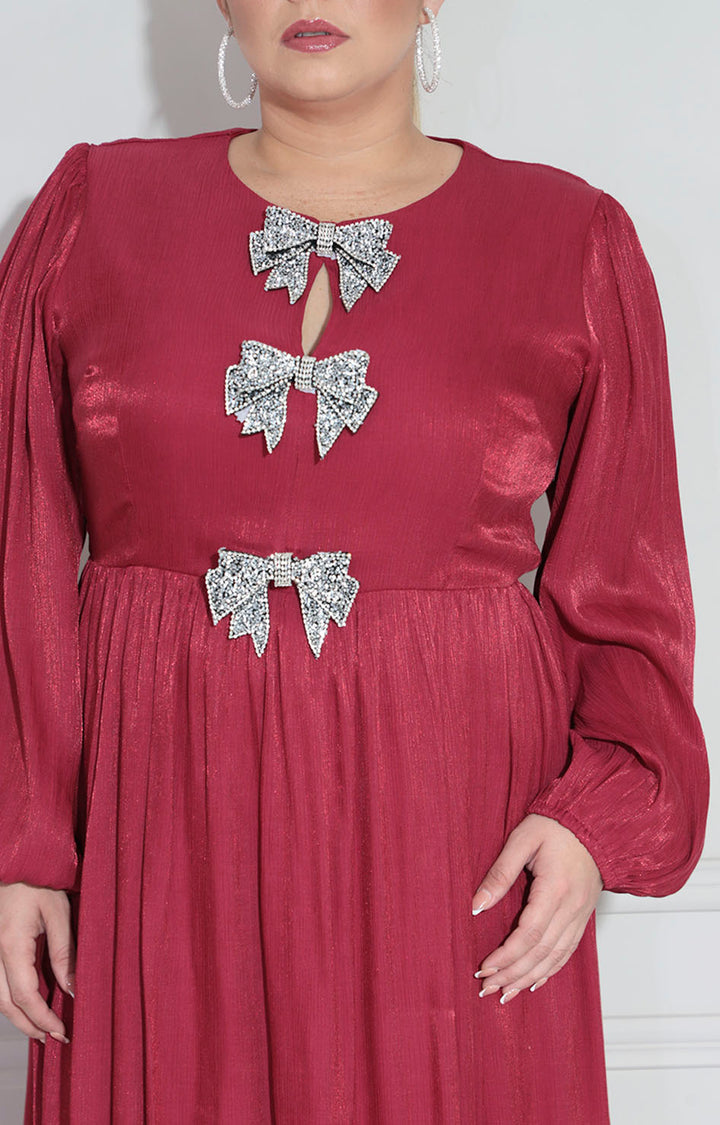 Vestido vino con moños