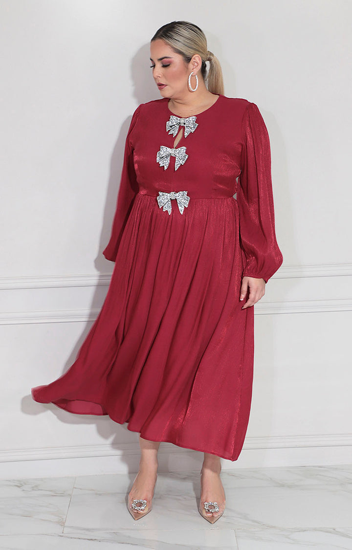 Vestido vino con moños