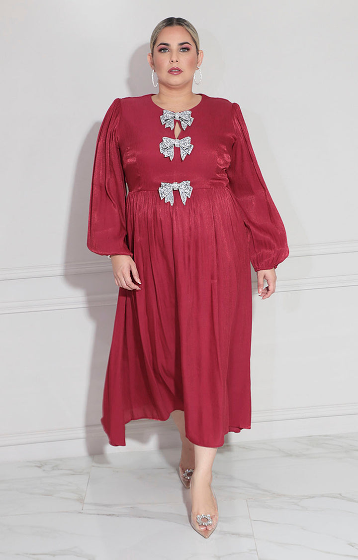 Vestido vino con moños