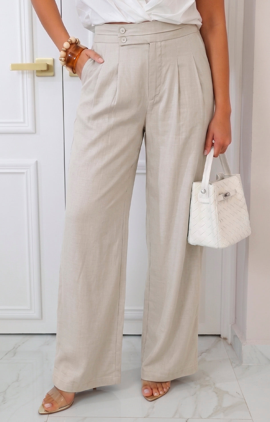 Pantalón recto con bolsas