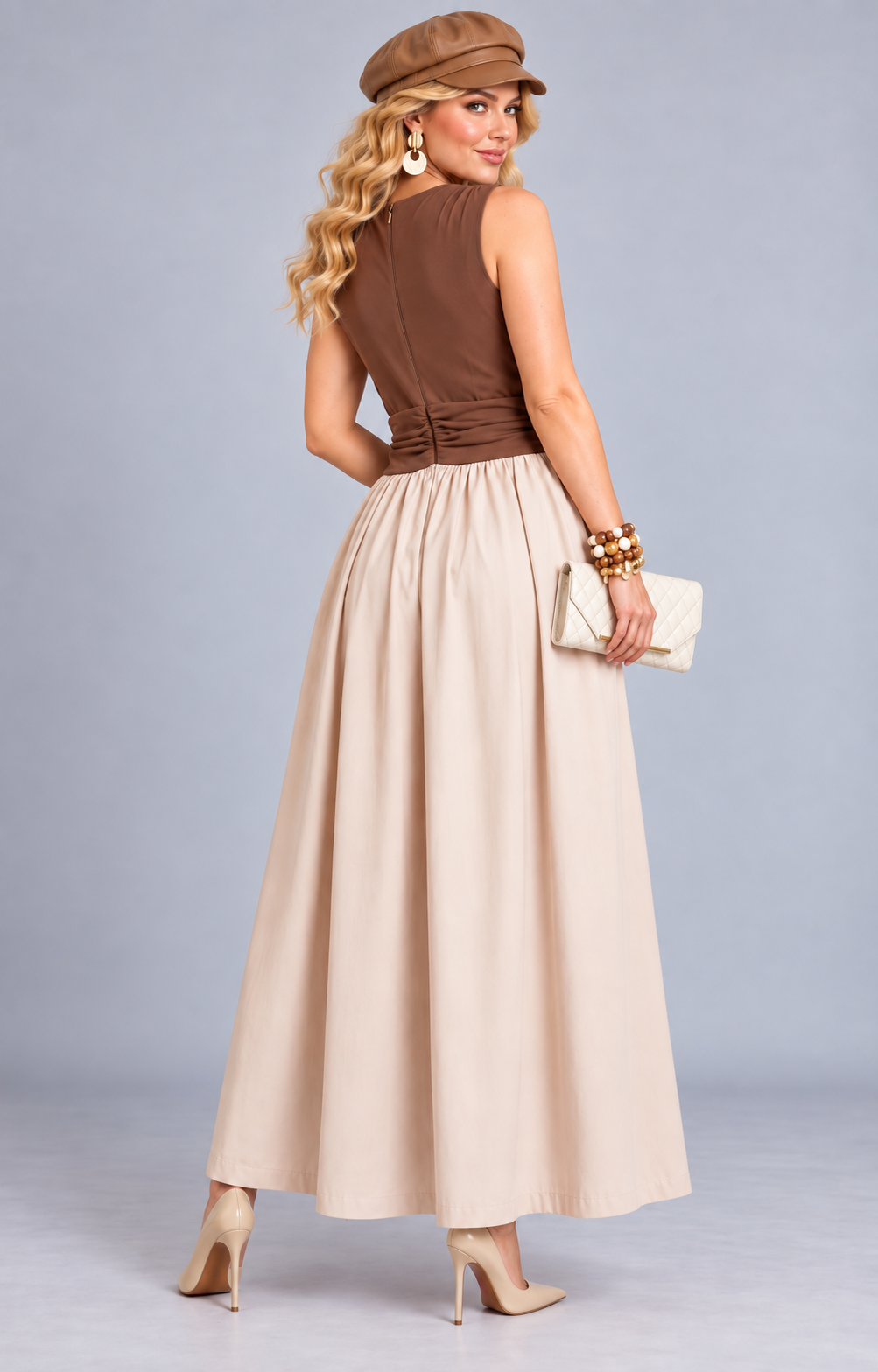 Vestido largo bicolor con pecho drapeado de la marca Boutiquemirel, diseño elegante y moderno para ocasiones especiales.