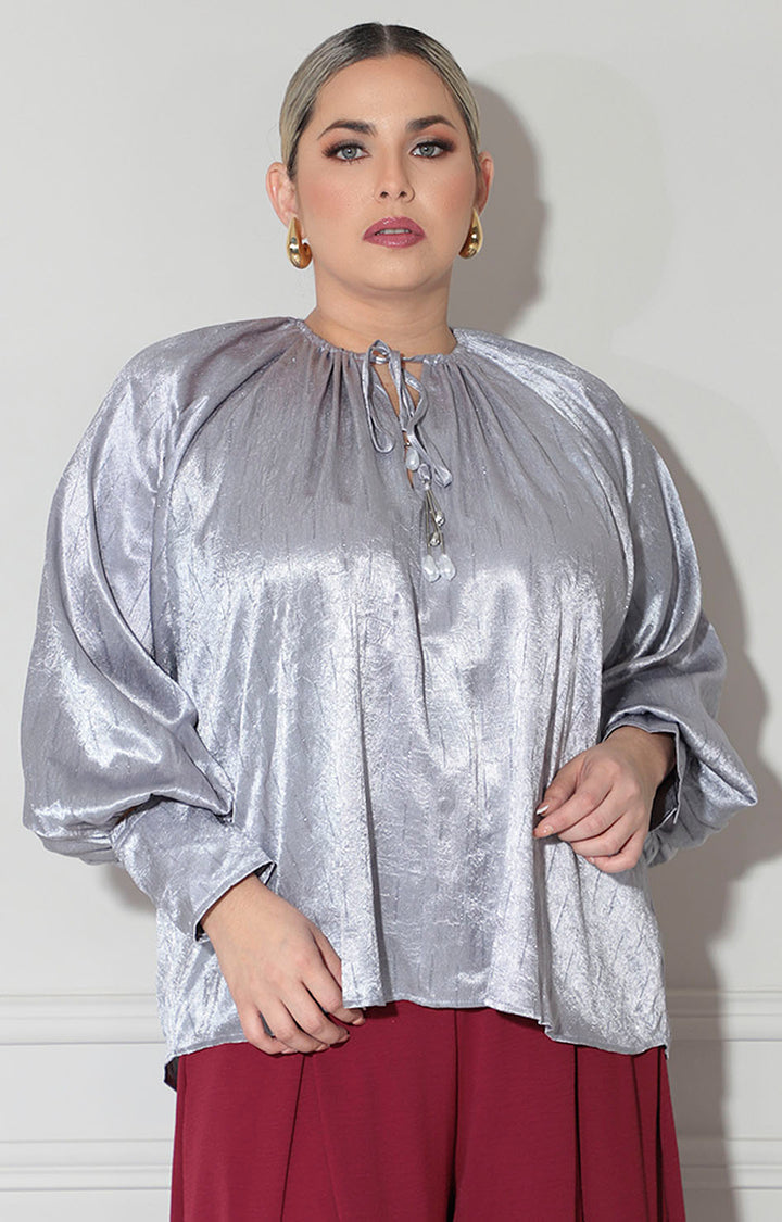 Blusa gris metálica