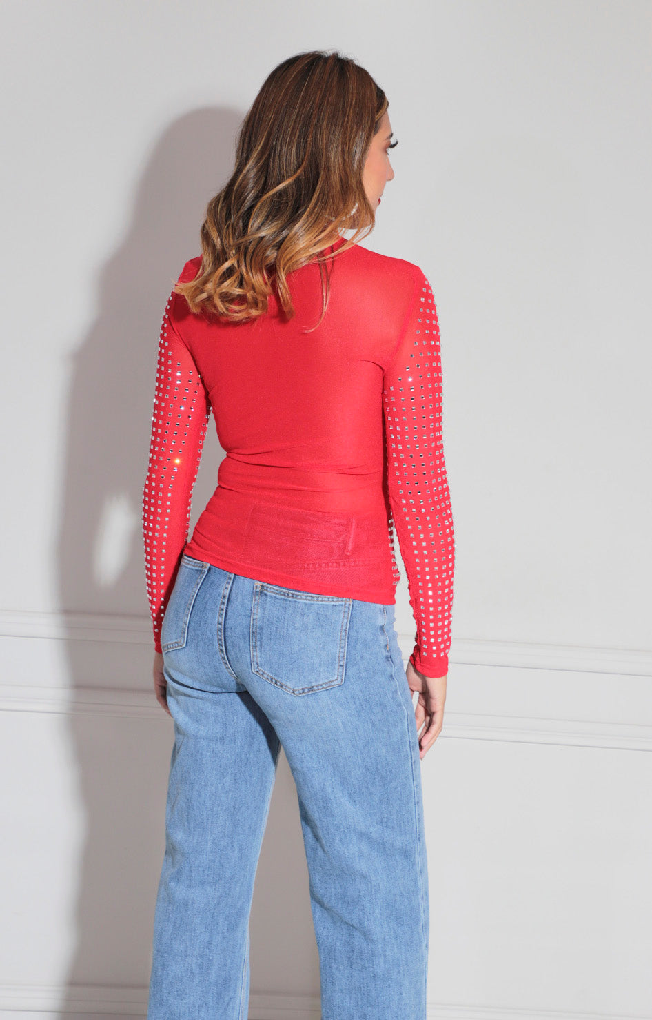 Blusa roja con pedrería