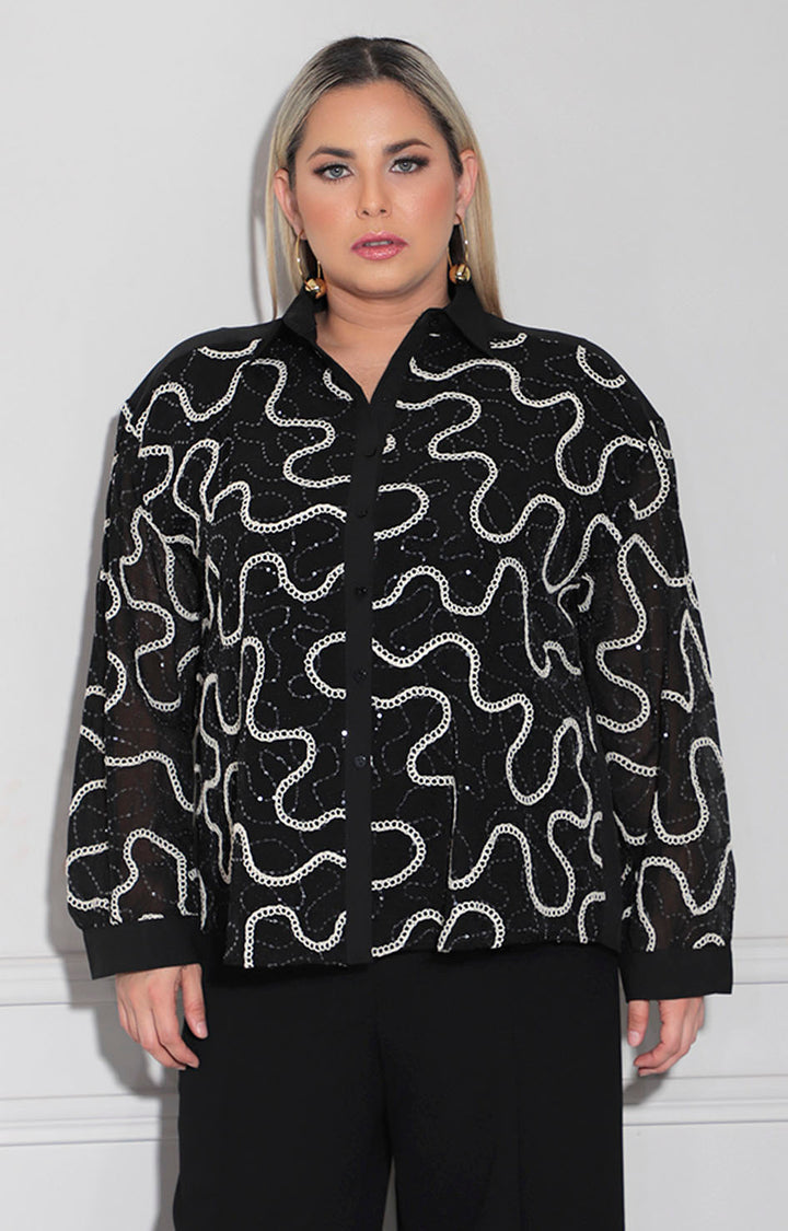 Blusa negra estampada
