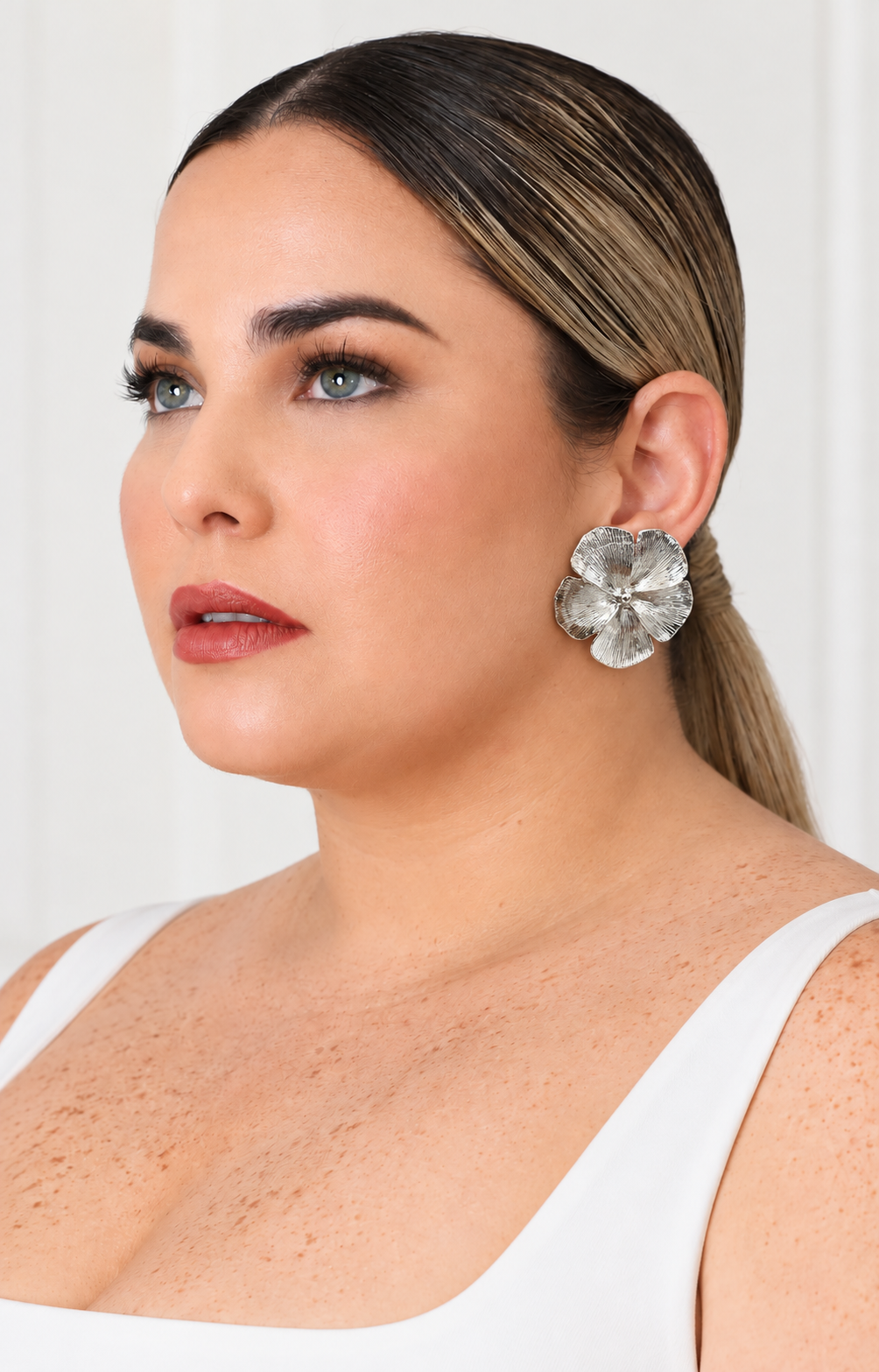 Aretes broquel tipo flor