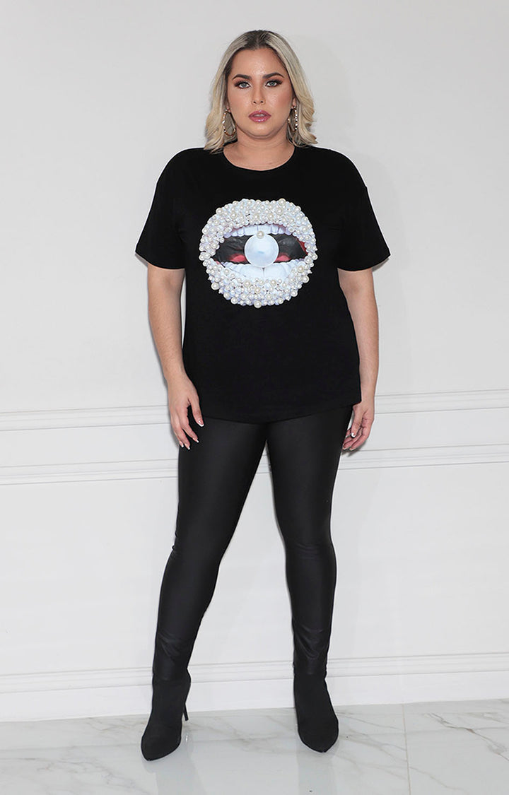 Blusa negra con perlas