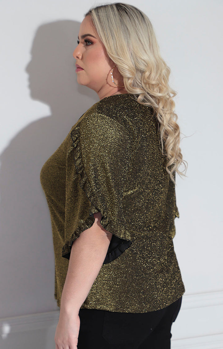 Blusa dorada