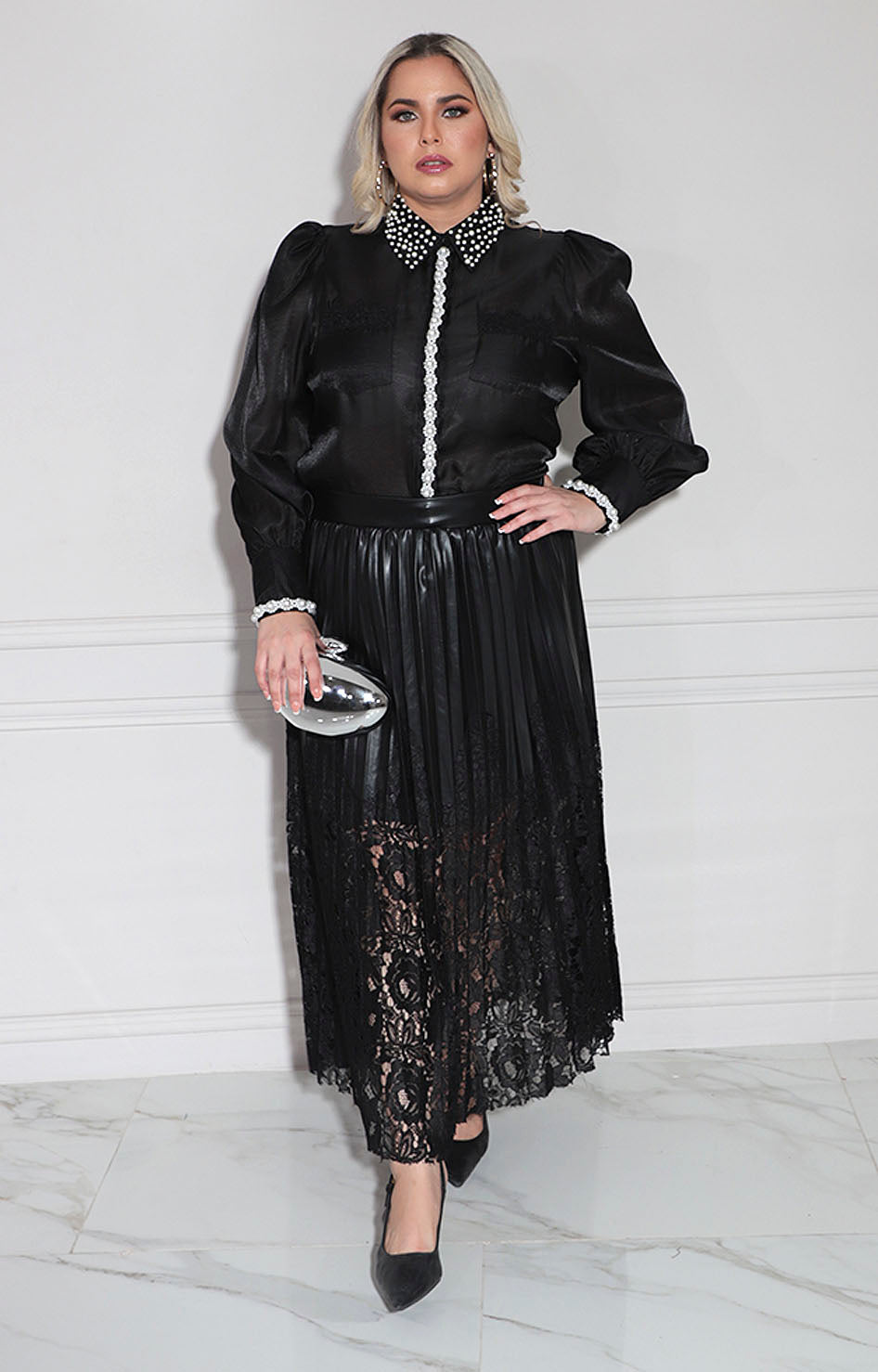 Blusa negra con perlas