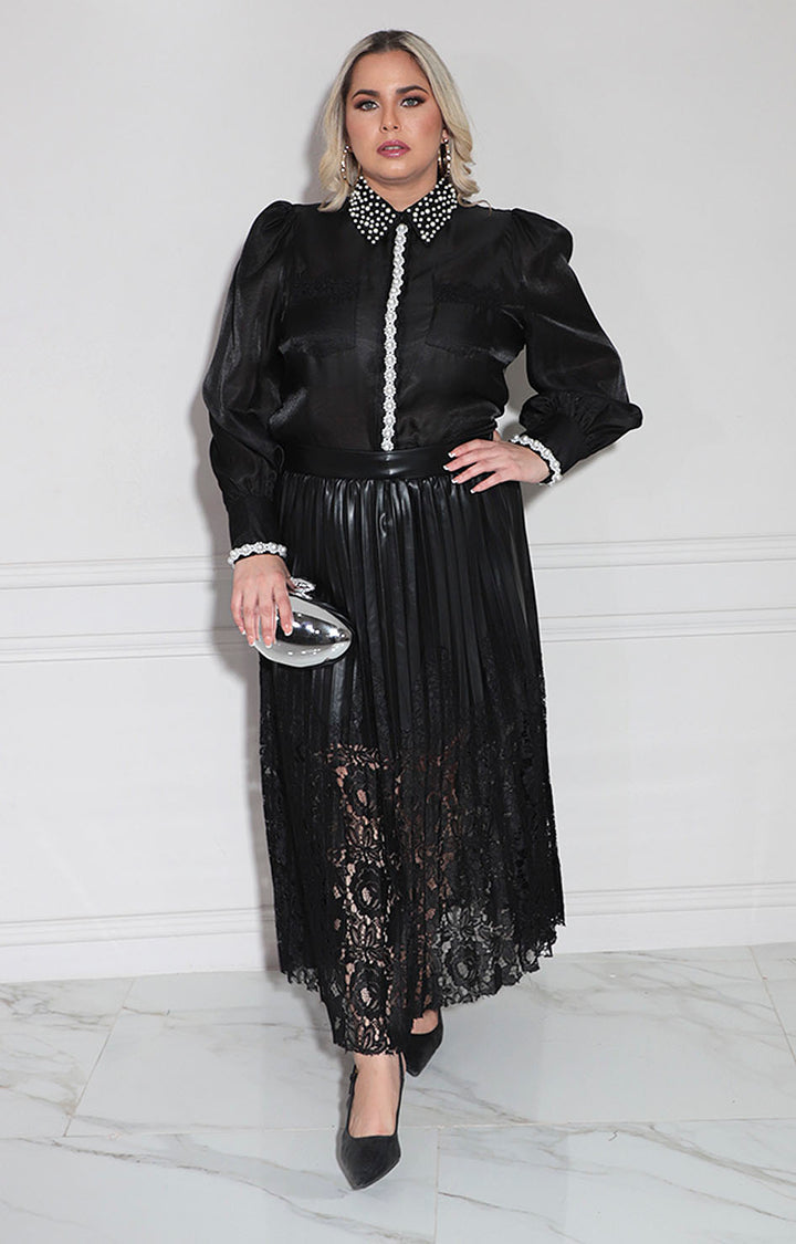 Blusa negra con perlas