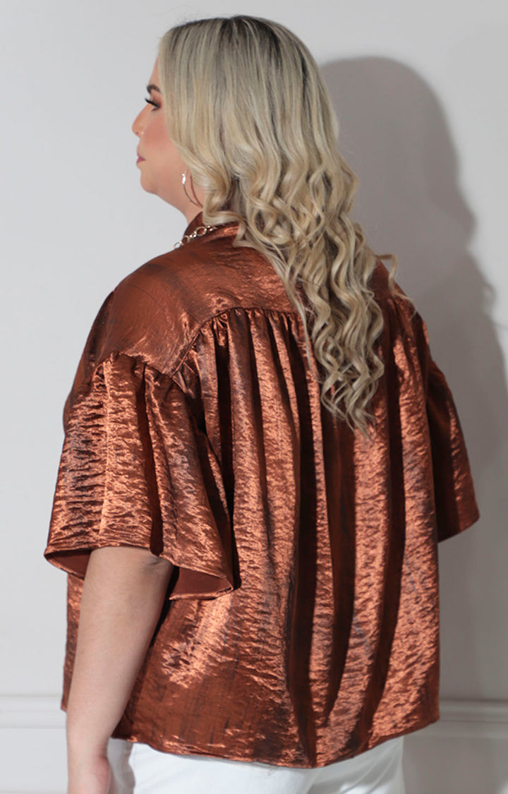 Blusa café con botones