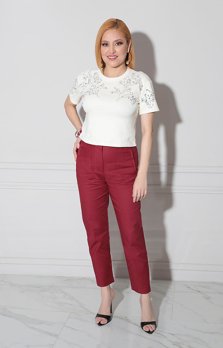 Blusa beige con aplicaciones