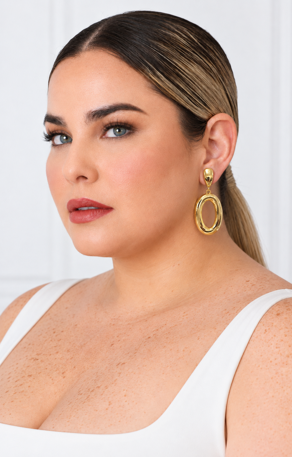 Aretes colgantes de aro ovalado
