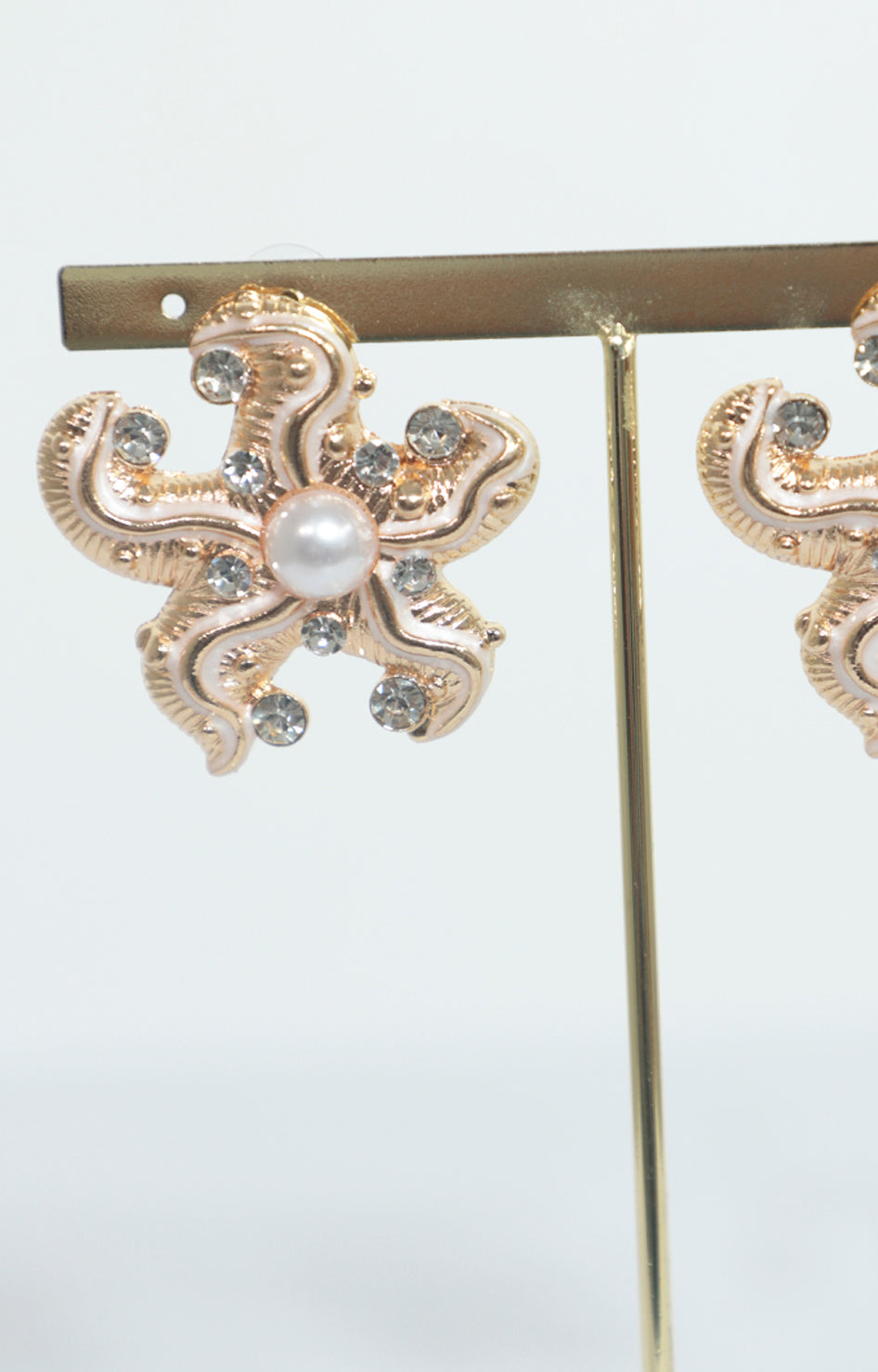 Aretes dorados de estrella con perlas - ARETE Boutiquemirel 