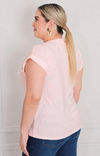 Blusa floral con aplicaciones