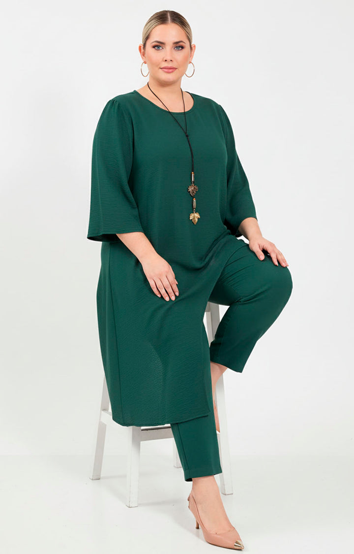 Blusa verde asimétrica