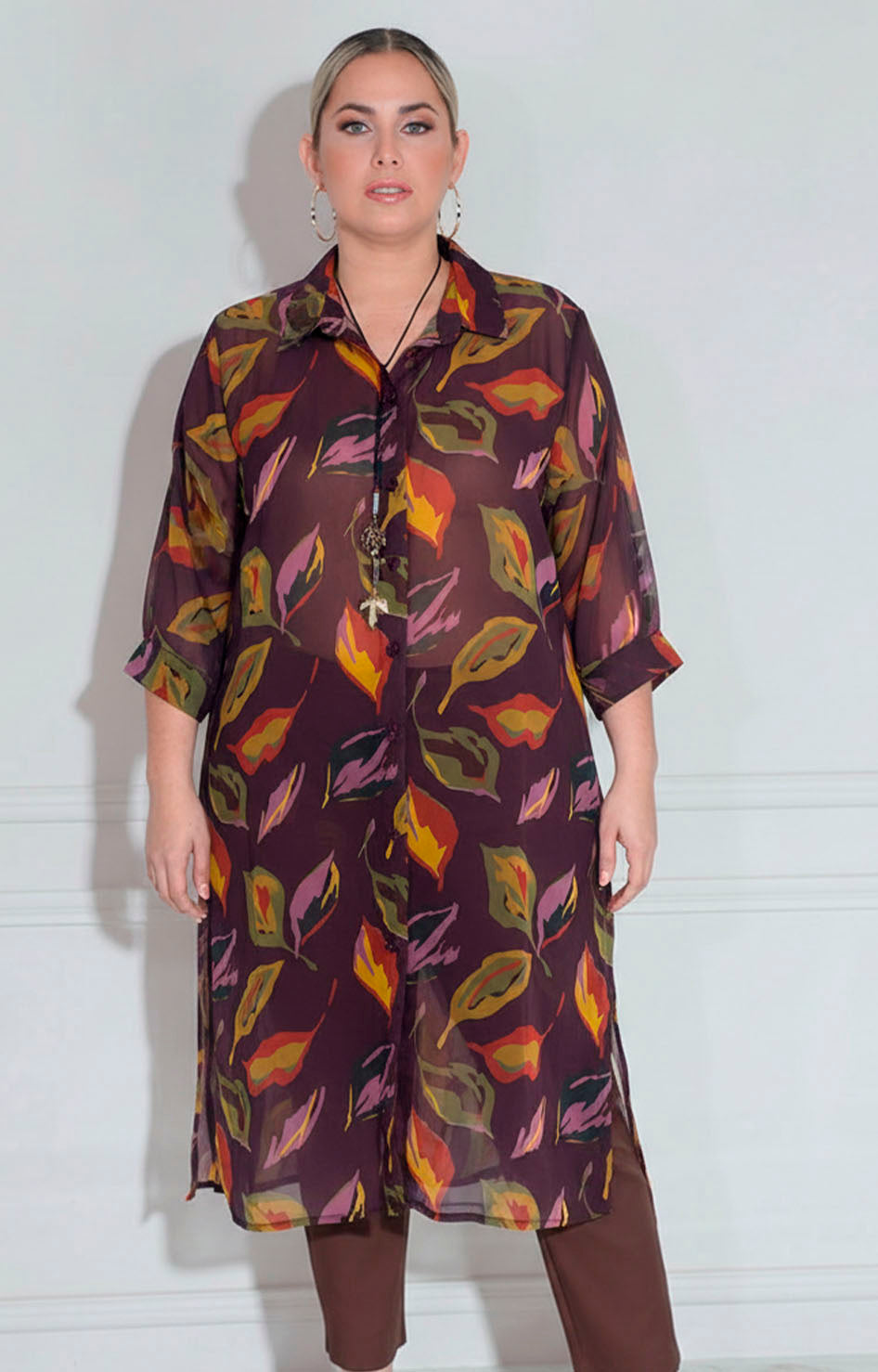 Blusón morado con hojas