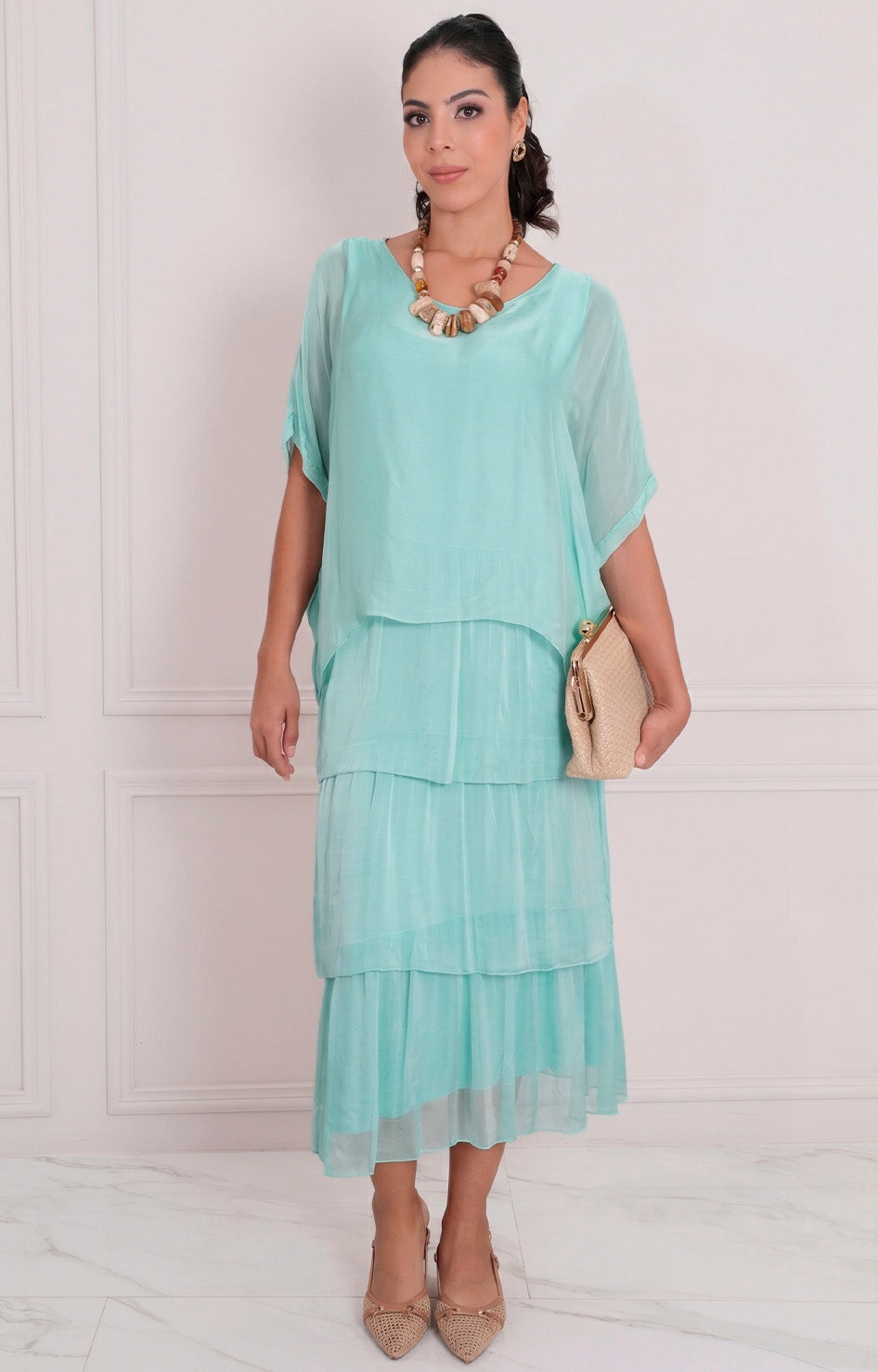 Vestido liso con volantes