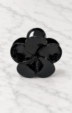 Pinza de cabello con flor de acetato
