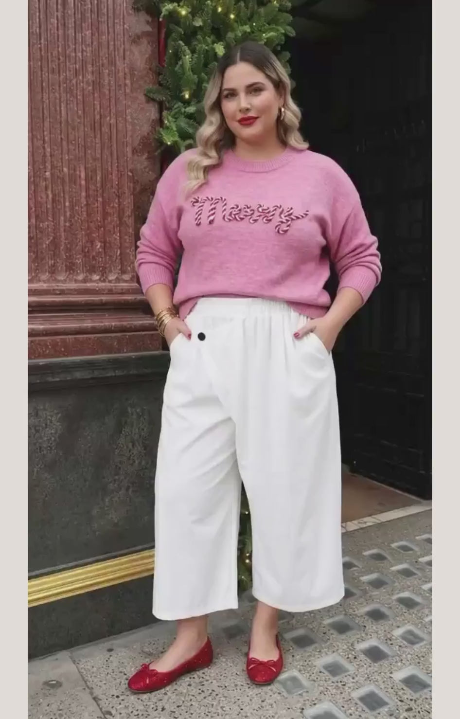 Suéter rosa con bordado