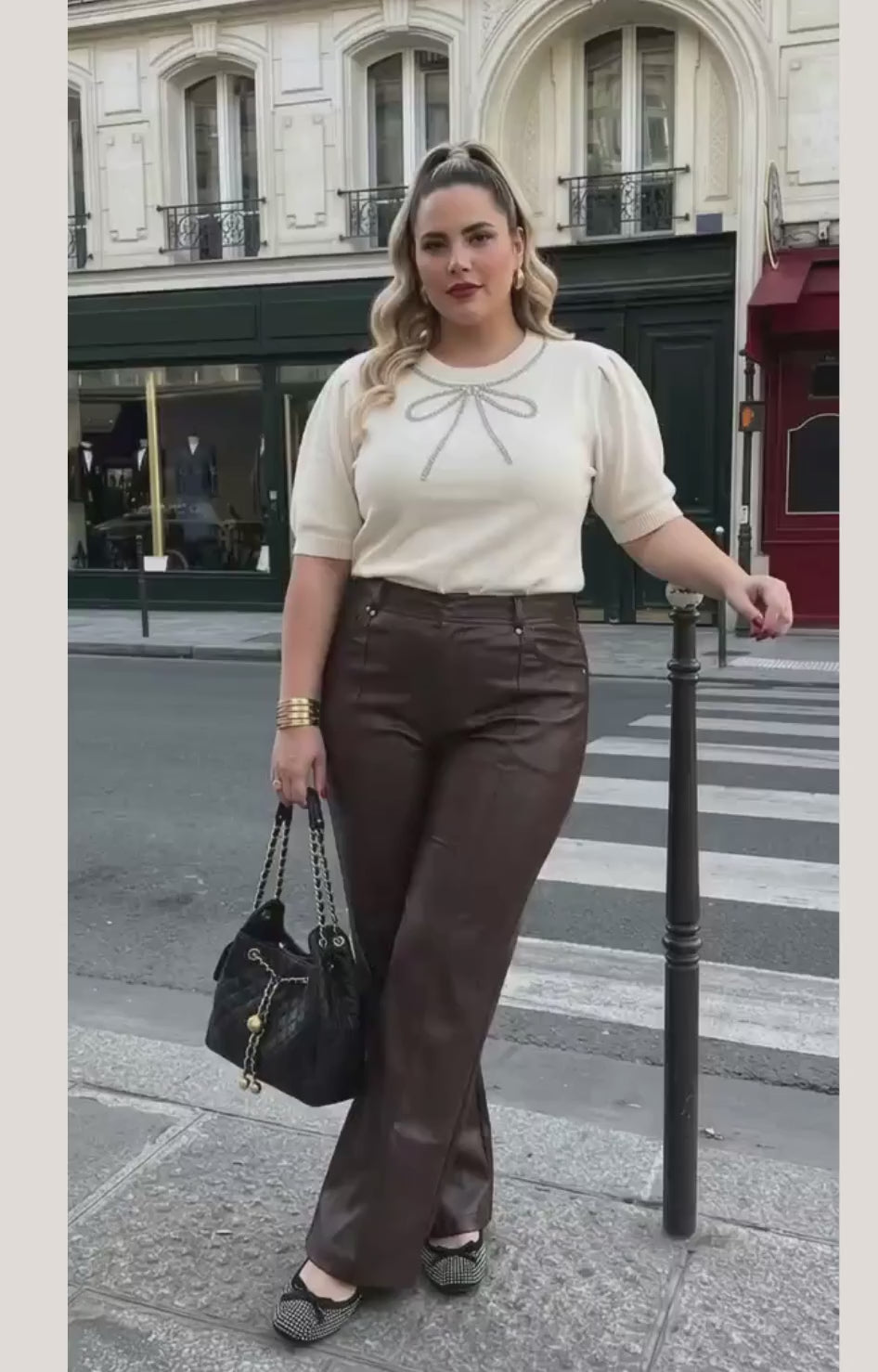 Blusa de punto beige con moño