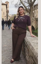 Blusa de punto beige con moño