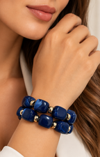 Set de pulseras de cuentas azules con dorado